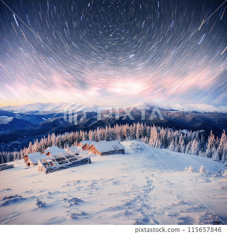 chalets in the mountains at night under the stars. Magic event in frosty day. In anticipation of the holiday. Dramatic scenes 115657846