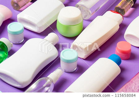 Group of plastic bodycare bottle Flat lay composition with cosmetic products on colored background empty space for you design. Set of White Cosmetic containers, top view with copy space 115658084