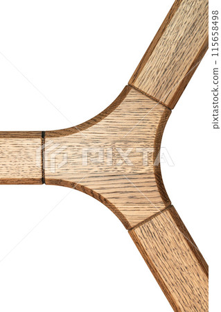 Triple jointed wooden frame of the table is made of solid oak on white background 115658498