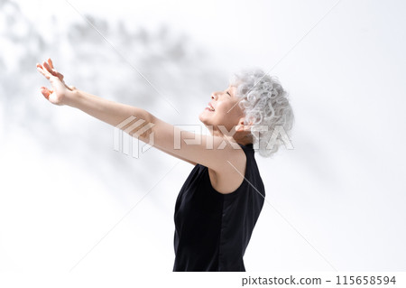 Stretching, stretching, gray hair woman Stretching, stretching, gray hair woman 115658594