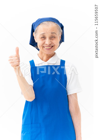 Senior woman housekeeping thumbs up Senior woman housekeeping thumbs up 115659507