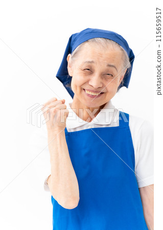 Senior woman housekeeping fist pump 115659517