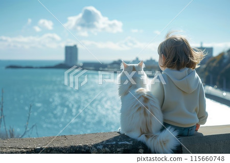 A white cat standing next to a girl looking at the sea 115660748