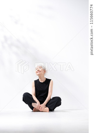 Gray-haired woman, full body, sitting, cross-legged Gray-haired woman, full body, sitting, cross-legged 115660774
