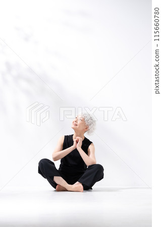 Gray-haired woman, full body, sitting, cross-legged Gray-haired woman, full body, sitting, cross-legged 115660780