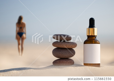 Sunscreen Oil Bottle Mockup at Beach Sunscreen Oil Bottle Mockup at Beach 115661550