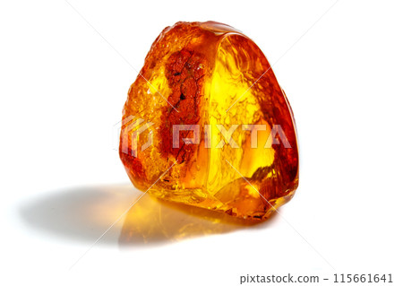 Macro stone mineral amber with insects, flies and beetles on a white background close up Macro stone mineral amber with insects, flies and beetles on a white background close up 115661641