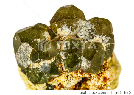 Macro stone Demantoid mineral on white background 115661650