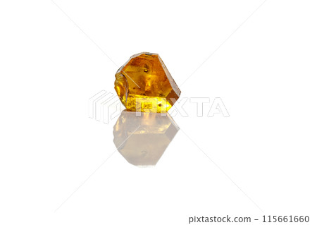 Macro yellow diamond mineral stone on white background Macro yellow diamond mineral stone on white background 115661660