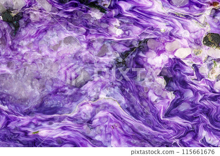Macro stone Charoite mineral on white background 115661676