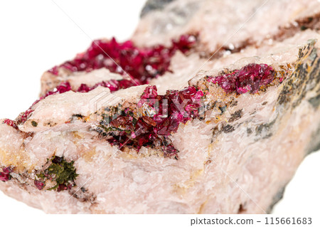 Macro stone Erythrite mineral on white background Macro stone Erythrite mineral on white background 115661683