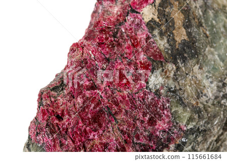 Macro stone Eudialyte mineral on white background 115661684
