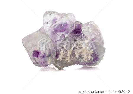 Macro mineral stone Fluorite crystal on a black background Macro mineral stone Fluorite crystal on a black background 115662000