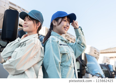 Two female truck drivers Two female truck drivers 115662425