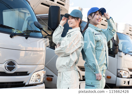 Two female truck drivers Two female truck drivers 115662426