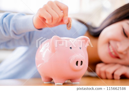 A woman saving money 115662586