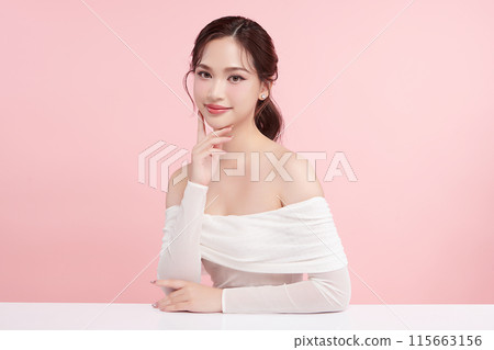 Beautiful young asian woman with clean fresh skin on pink background, Face care, Facial treatment, Cosmetology, beauty and spa, Asian women portrait. Beautiful young asian woman with clean fresh skin on pink background, Face care, Facial treatment, Cosmetology, beauty and spa, Asian women portrait. 115663156