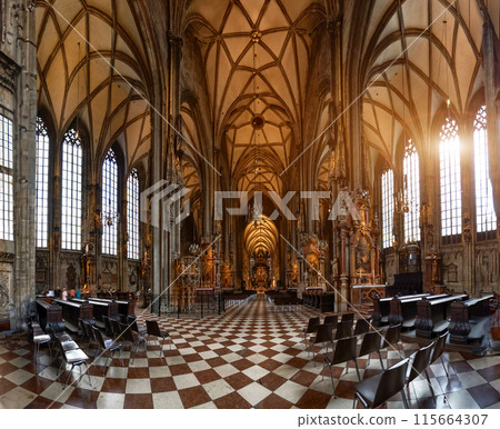 Vienna, Austria, August 17, 2022. Interior of St. Stephen's Cathedral, natural light coming in through the large windows. No people, large format photo. Vienna, Austria, August 17, 2022. Interior of St. Stephen's Cathedral, natural light coming in through the large windows. No people, large format photo. 115664307