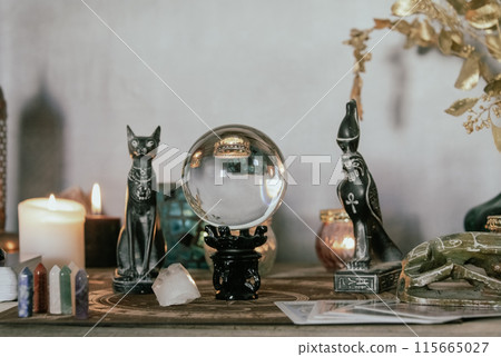 Esoteric Divination Setup with Tarot Cards and Crystal Ball. 115665027