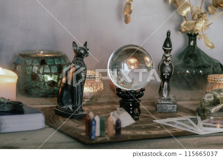 Esoteric Divination Setup with Tarot Cards and Crystal Ball. Esoteric Divination Setup with Tarot Cards and Crystal Ball. 115665037