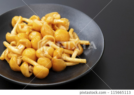 Nameko mushroom on black background 115665113