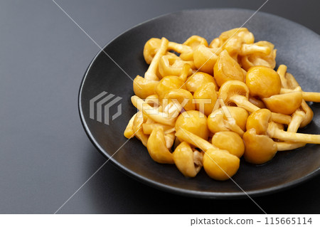 Nameko mushroom on black background Nameko mushroom on black background 115665114