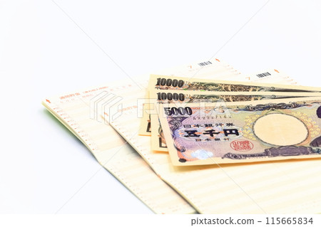 銀行存摺和鈔票的圖像 銀行存摺和鈔票的圖像 115665834