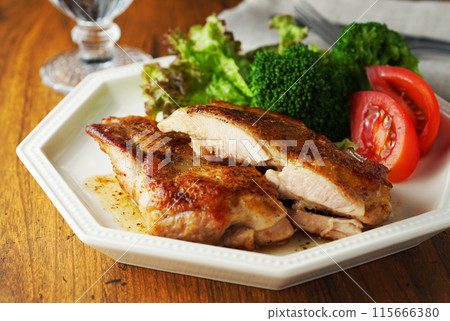 Crispy chicken sauteed in butter 115666380