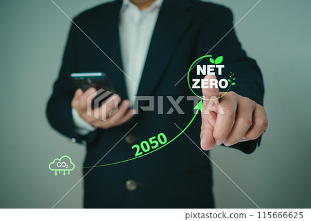 Businessman point to Net zero icon with carbon CO2 reduction for decrease within the year 2050, Carbon footprint and carbon credit to limit global warming from climate change, Bio Circular Green Businessman point to Net zero icon with carbon CO2 reduction for decrease within the year 2050, Carbon footprint and carbon credit to limit global warming from climate change, Bio Circular Green 115666625