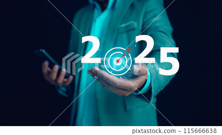 Businessman holds text 2025 with arrow target, Implementation of business goals plan, Set goals for 2025, Development to achieve goals and success. Businessman holds text 2025 with arrow target, Implementation of business goals plan, Set goals for 2025, Development to achieve goals and success. 115666638
