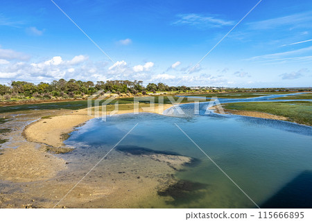 Landscape view of Parque Natural da Ria Formosa near Faro, Portugal 115666895