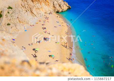 Top view on the beach and umbrellas. A place for relaxation and recovery. Top view on the beach and umbrellas. A place for relaxation and recovery. 115667217