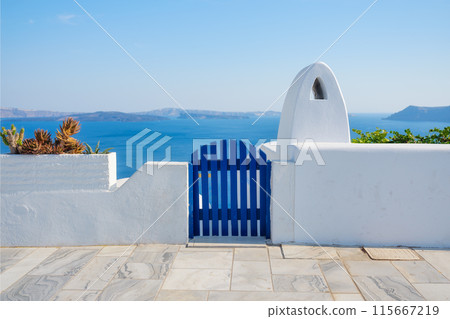 Traditional courtyard entrance in the village of Oia, Santorini, Greece.  115667219