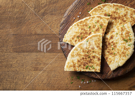 Pita bread, homemade flatbread, tortilla Pita bread, homemade flatbread, tortilla 115667357