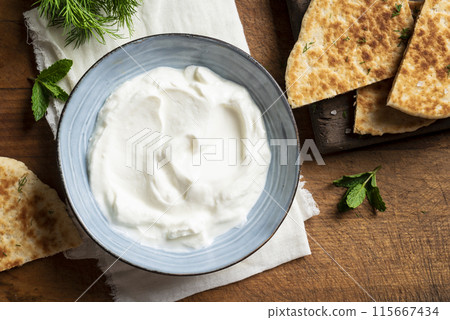 Homemade Yogurt Labneh Cheese Dip and Pita Homemade Yogurt Labneh Cheese Dip and Pita 115667434