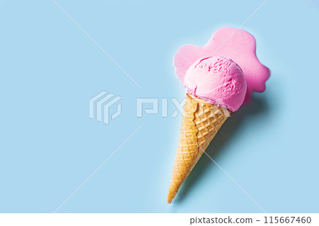 Pink ice cream melting and spilling 115667460