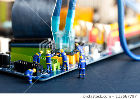Miniature technicians working on circuit board 115667797