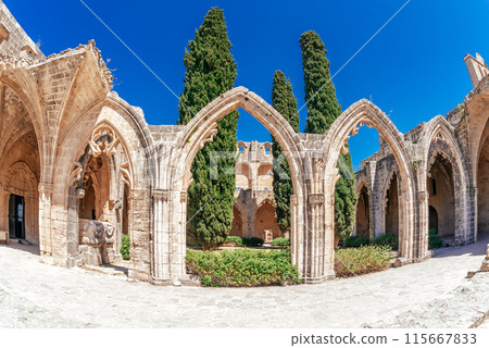 Panoramic view of medieval Bellapais monastery ruins. Kyrenia District, Cyprus 115667833