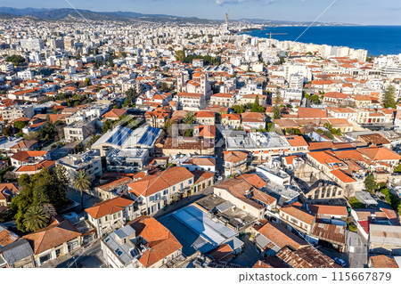 Aerial view of Limassol city showing rooftops and coastline in background on sunny day. Cyprus Aerial view of Limassol city showing rooftops and coastline in background on sunny day. Cyprus 115667879