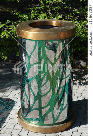 Kyiv, Ukraine April 11, 2024: Stylish urn in the summer park of the Pechersk Botanical Garden in the city of Kyiv 115668087