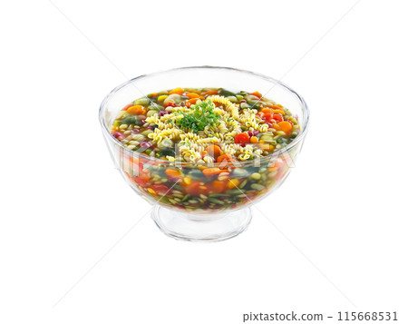 Minestrone Soup with mixed vegetables beans and pasta served in a transparent glass bowl Italian Minestrone Soup with mixed vegetables beans and pasta served in a transparent glass bowl Italian 115668531