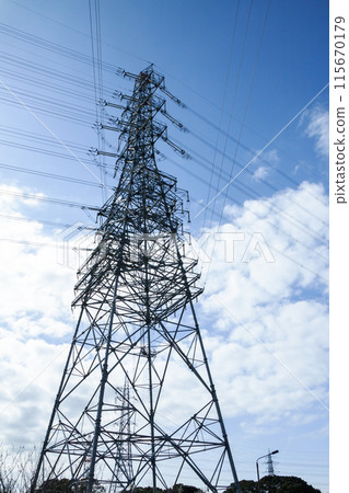Tower rising in the blue sky 115670179
