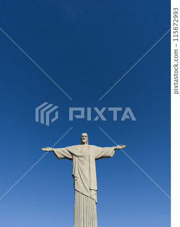 the majestic Christ the redeemer statue stands tall against a clear blue sky in Rio the majestic Christ the redeemer statue stands tall against a clear blue sky in Rio 115672993
