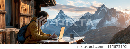 Professional working remotely in mountain area 115673192