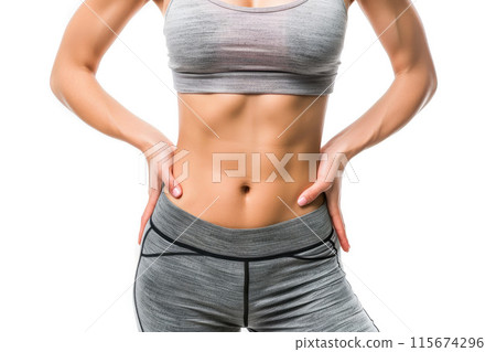 Woman showcasing her fit midsection 115674296