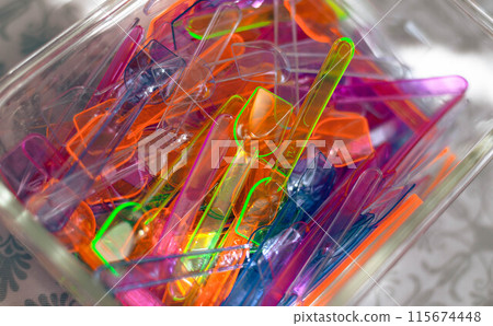 Rainbow colored plastic spoons. Background Ecology. Generative AI Rainbow colored plastic spoons. Background Ecology. Generative AI 115674448