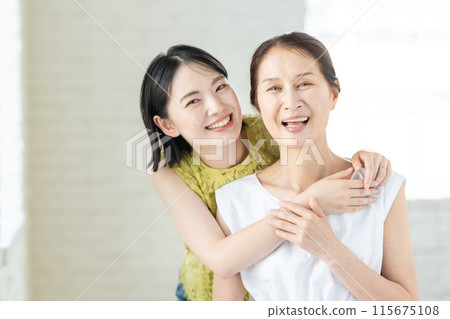 Portrait of a senior woman and her daughter 115675108