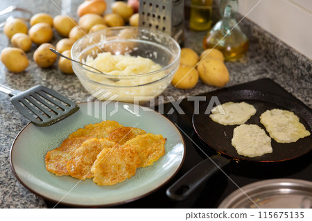 Frying of traditional Belarusian potato pancakes 115675135
