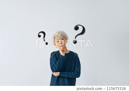 Senior woman with doubt Senior woman with doubt 115675526