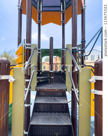 Colorful children playground activities in community public park  115675583